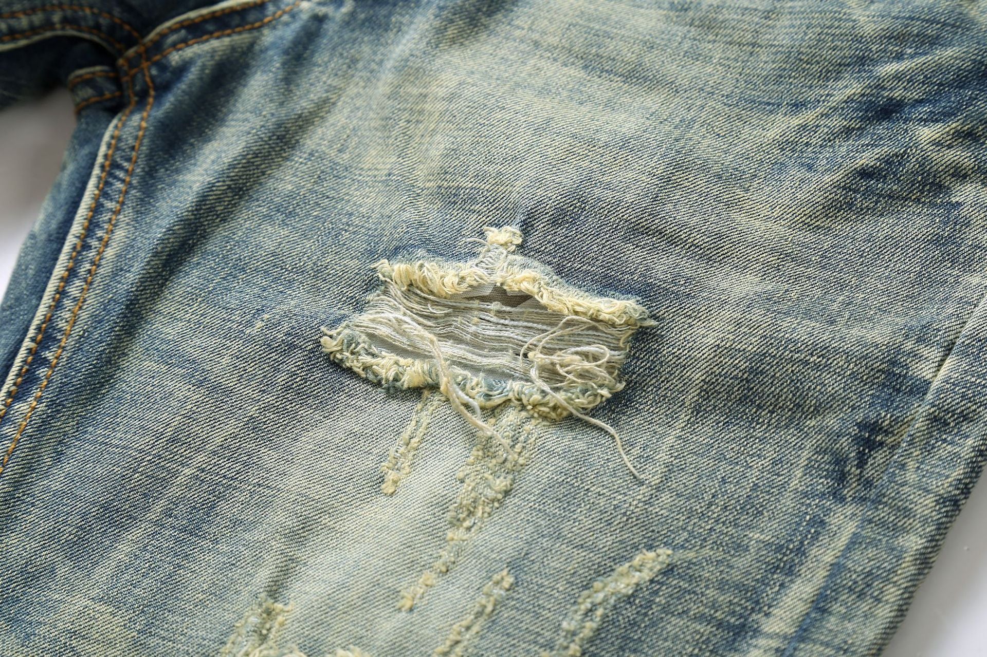 Men's Destruction Printed Mid-Rise Jeans.